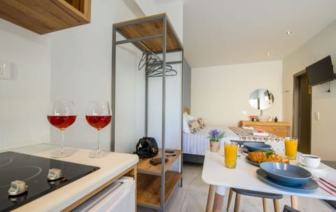 Deluxe Studio | Desk, laptop workspace, blackout drapes, soundproofing