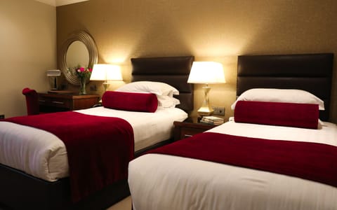 Classic Twin Room | Egyptian cotton sheets, down comforters, pillowtop beds, in-room safe