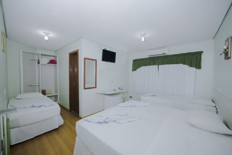 Standard Quadruple Room | 1 bedroom, minibar, in-room safe, desk