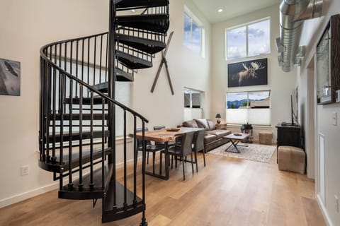 The spiral staircase is fun and ultra-modern! And, check out the views! | Main Level