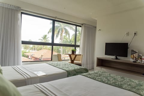 Superior Room, Multiple Beds, Partial Sea View | Minibar, individually decorated, blackout drapes, free WiFi