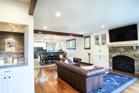 Large living room and dining room, open to kitchen. Gas fireplace.