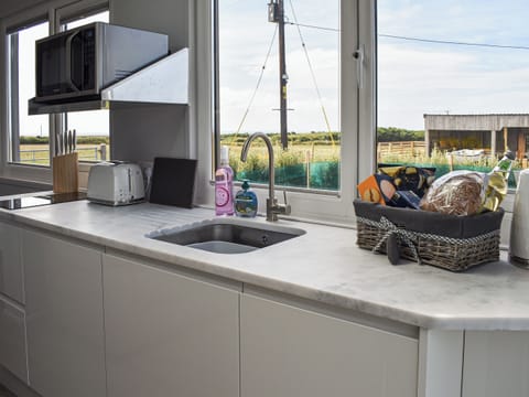 Kitchen | Swn Y Mor - Anglesey Vacations, Penrhos Feilw, near Trearddur Bay