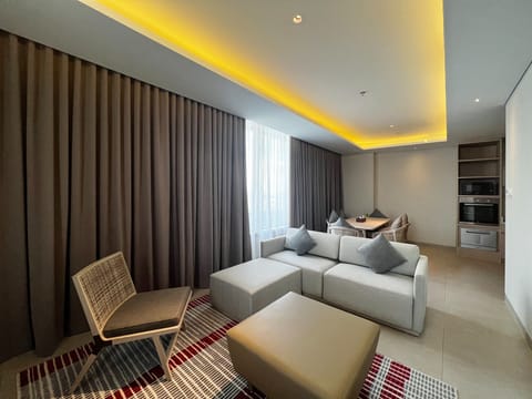 Three Bedroom Suite | Living area | 40-inch LED TV with satellite channels, TV