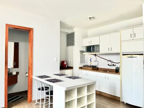 Apartment | Private kitchen | Microwave, stovetop, cookware/dishes/utensils