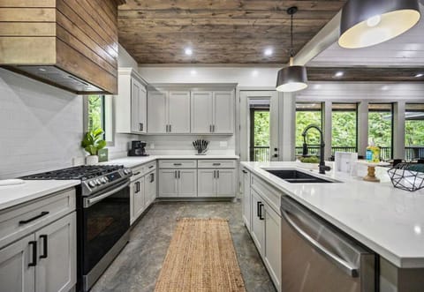 Savor the flavors of your getaway in our sleek kitchen, where style and practicality are perfectly paired.