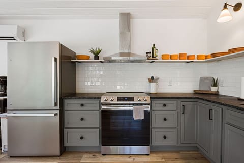 Fully-stocked and updated kitchen. Fridge with ice maker.