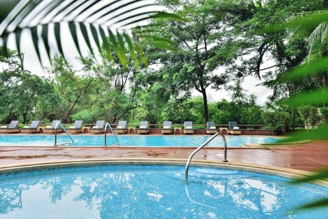 Outdoor pool, pool umbrellas, sun loungers