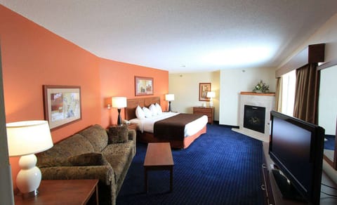 Superior Suite, 1 King Bed, Non Smoking | Individually decorated, individually furnished, desk, blackout drapes