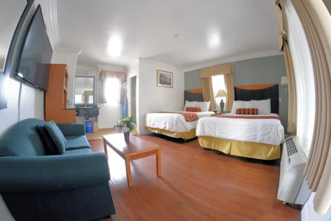 Deluxe Room, Two Queen Beds and Sofa Bed | Blackout drapes, iron/ironing board, free WiFi, bed sheets