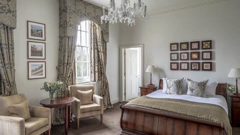 Deluxe King bedded room in historic Mansion House | In-room safe, desk, blackout drapes, iron/ironing board