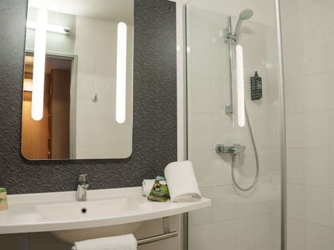 Standard Room, Multiple Beds | Bathroom | Eco-friendly toiletries, hair dryer, towels