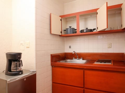 Suite, 2 Double Beds | Private kitchenette