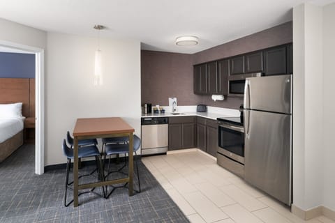 Suite, 1 Bedroom | Private kitchen | Full-size fridge, microwave, stovetop, dishwasher