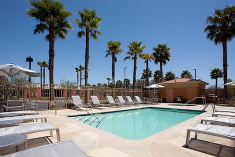 Outdoor pool, open 8:00 AM to 9:00 PM, pool umbrellas, sun loungers