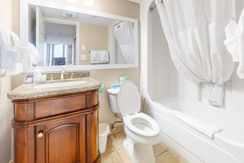 Condo, 1 Bedroom (Partial Ocean View 2 Queen) | Bathroom | Combined shower/tub, free toiletries, hair dryer, towels