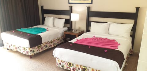 Deluxe Room, Ocean View | In-room safe, iron/ironing board, free WiFi, bed sheets