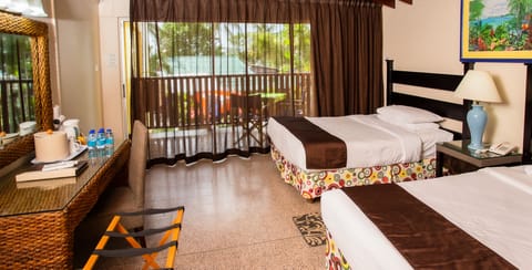 Deluxe Room, Ocean View | In-room safe, iron/ironing board, free WiFi, bed sheets