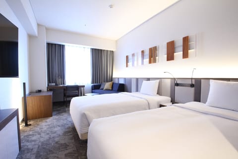 Premium Room, Multiple Beds (High Floor) | In-room safe, desk, laptop workspace, blackout drapes