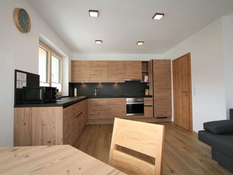 Cabinetry, Furniture, Property, Countertop, Wood, Lighting, Interior Design, Drawer, Flooring, Wood Stain