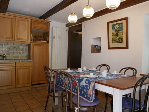 Table, Furniture, Property, Cabinetry, Chair, Building, Wood, Lighting, Interior Design, Flooring