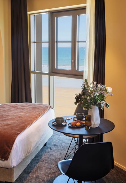 Suite, 1 King Bed, Sea View | In-room safe, desk, blackout drapes, soundproofing