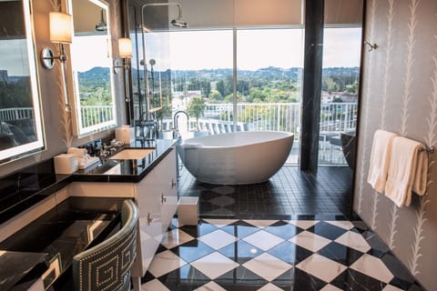 Presidential Suite | Bathroom | Designer toiletries, hair dryer, bathrobes, towels