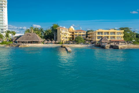 Private beach, white sand, sun loungers, beach umbrellas