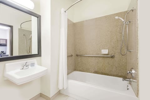 Suite, 2 Queen Beds, Accessible, Non Smoking (Mobility,Hearing,Tub w/Grab Bars) | Bathroom | Combined shower/tub, hair dryer, towels