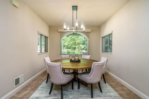 Formal dining room sits up to 8 guests.