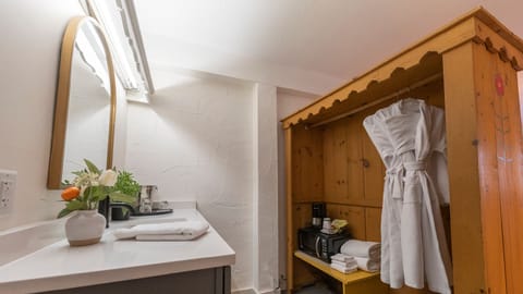 Deluxe Suite, 2 Bedrooms | Hypo-allergenic bedding, desk, laptop workspace, iron/ironing board