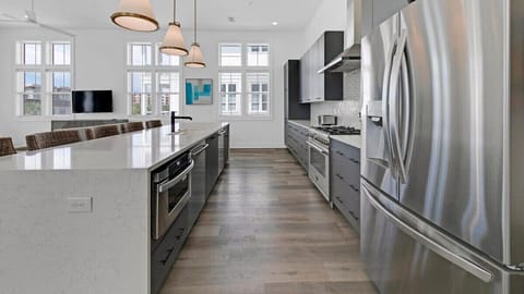 Large refrigerator, microwave and two dishwashers