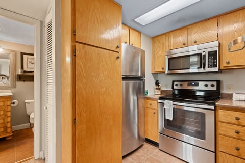 Condo, 1 Queen Bed with Sofa bed, Balcony, Mountain View (#C102 - No Pets Allowed) | Private kitchen | Fridge, microwave, oven, stovetop