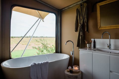 Luxury Tent | Bathroom | Separate tub and shower, deep soaking tub, rainfall showerhead