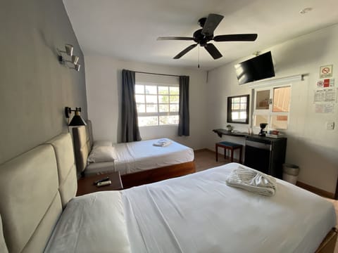 Standard Triple Room (with Fan and AC) | In-room safe, desk, free WiFi, bed sheets