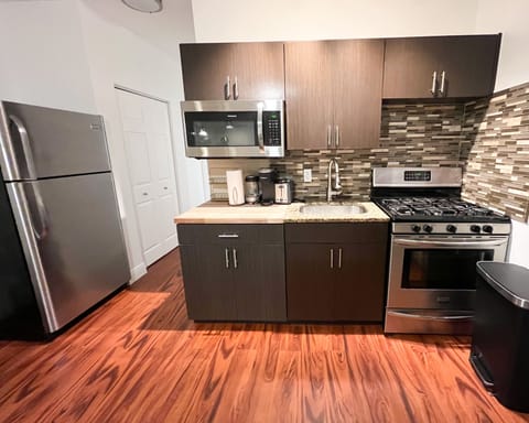 Standard Apartment, 1 Queen Bed with Sofa bed, Non Smoking (Suite Four) | Private kitchen | Full-size fridge, microwave, oven, stovetop