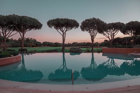 Indoor pool, outdoor pool, pool umbrellas