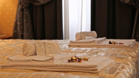 Premium bedding, down comforters, in-room safe, desk