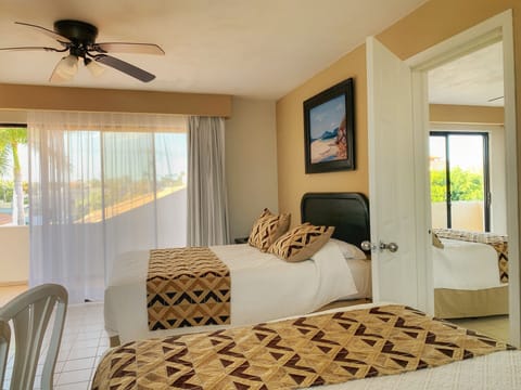 Family Room, 2 Bedrooms, Pool View | Minibar, soundproofing, free cribs/infant beds, free WiFi
