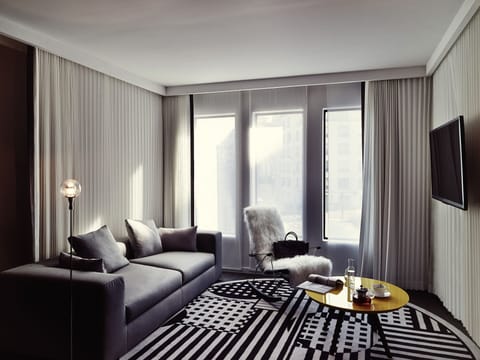 Suite, 2 Double Beds, View (Lounge Area. Paris view) | Living area | 40-inch TV with cable channels, pay movies