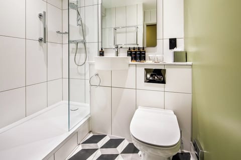 Shower, eco-friendly toiletries, hair dryer, towels