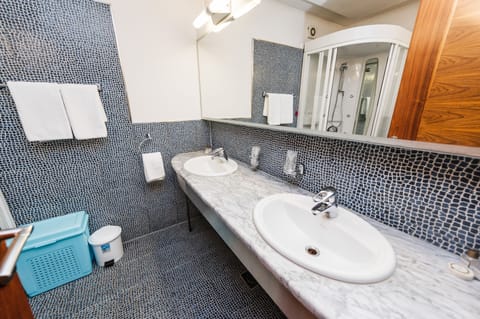 Junior Room | Bathroom | Jetted tub, hair dryer, slippers, towels