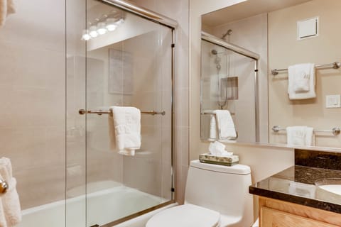 Premier Condo, 2 Bedrooms | Bathroom | Combined shower/tub, free toiletries, hair dryer, towels