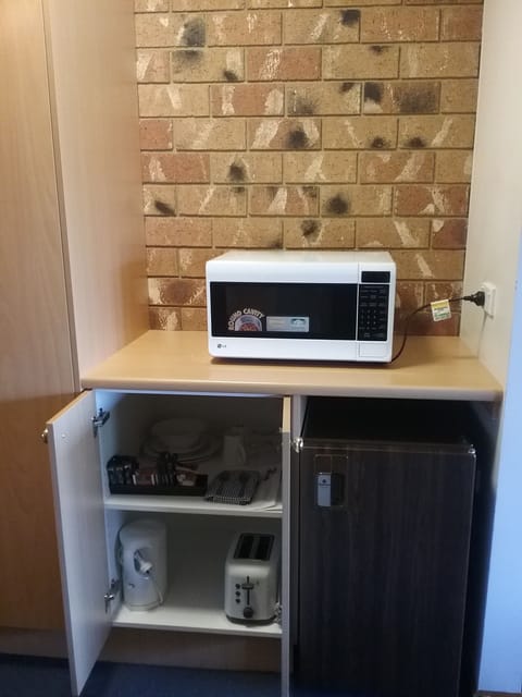 Mini-fridge, microwave, coffee/tea maker, electric kettle