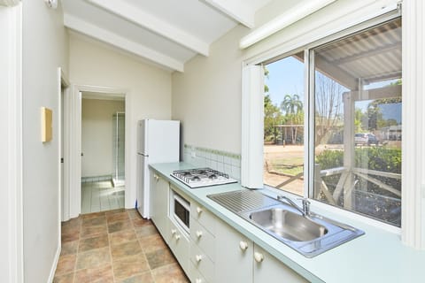 Standard 2 Bedroom - Sleeps 3 | Private kitchen | Full-size fridge, microwave, stovetop, coffee/tea maker