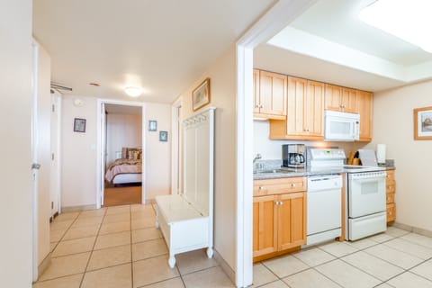 1-Bedroom Condominium - 1107 | Private kitchen | Full-size fridge, microwave, stovetop, dishwasher