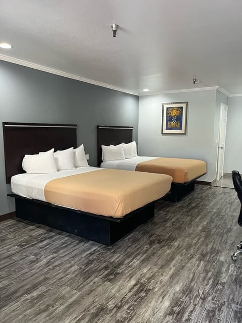 Two Queen Beds | Blackout drapes, soundproofing, iron/ironing board, free WiFi