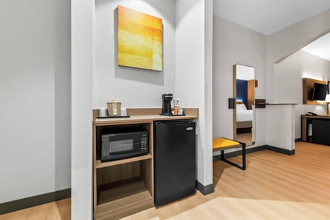 Suite, Non Smoking | 1 bedroom, desk, laptop workspace, iron/ironing board