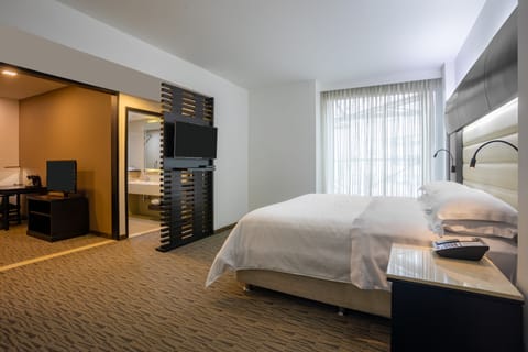 Junior Suite, 1 Bedroom | Premium bedding, minibar, in-room safe, desk