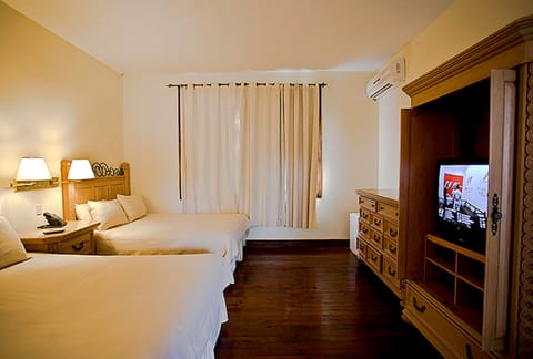 Standard Room, 2 Queen Beds, Garden View | Premium bedding, in-room safe, desk, free WiFi